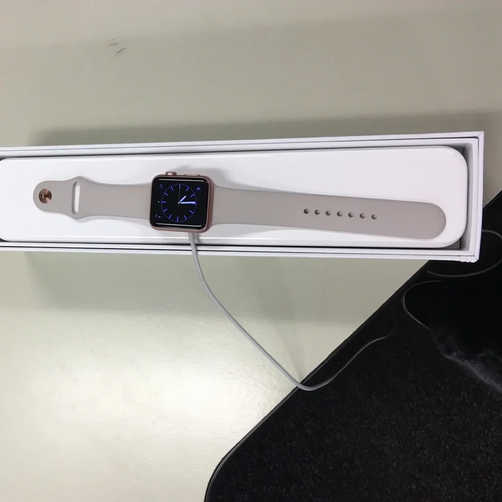 Apple Watch 42mm Rose Gold Smartwatch with Light Beige Silicone Strap